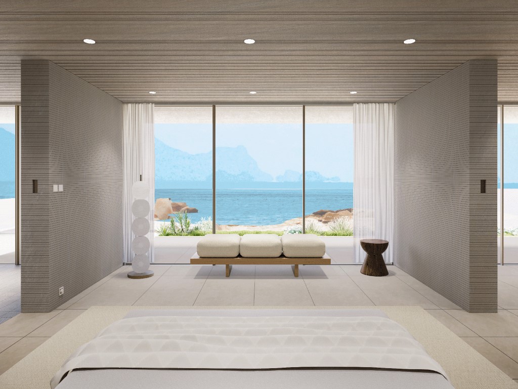 Villa living room with floor-to-ceiling glass framing a sea view