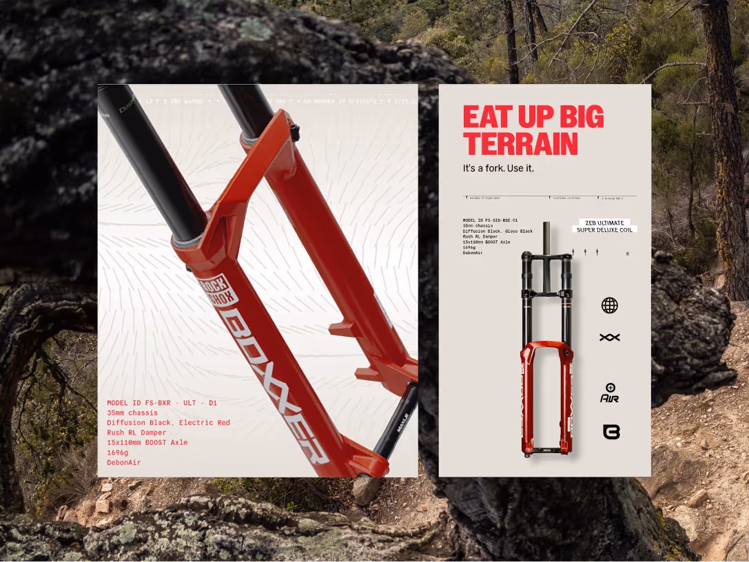 Advertisement for BoXXer mountain bike fork featuring a close-up red fork on the left and a full view with technical details on the right, set against a rocky terrain background.