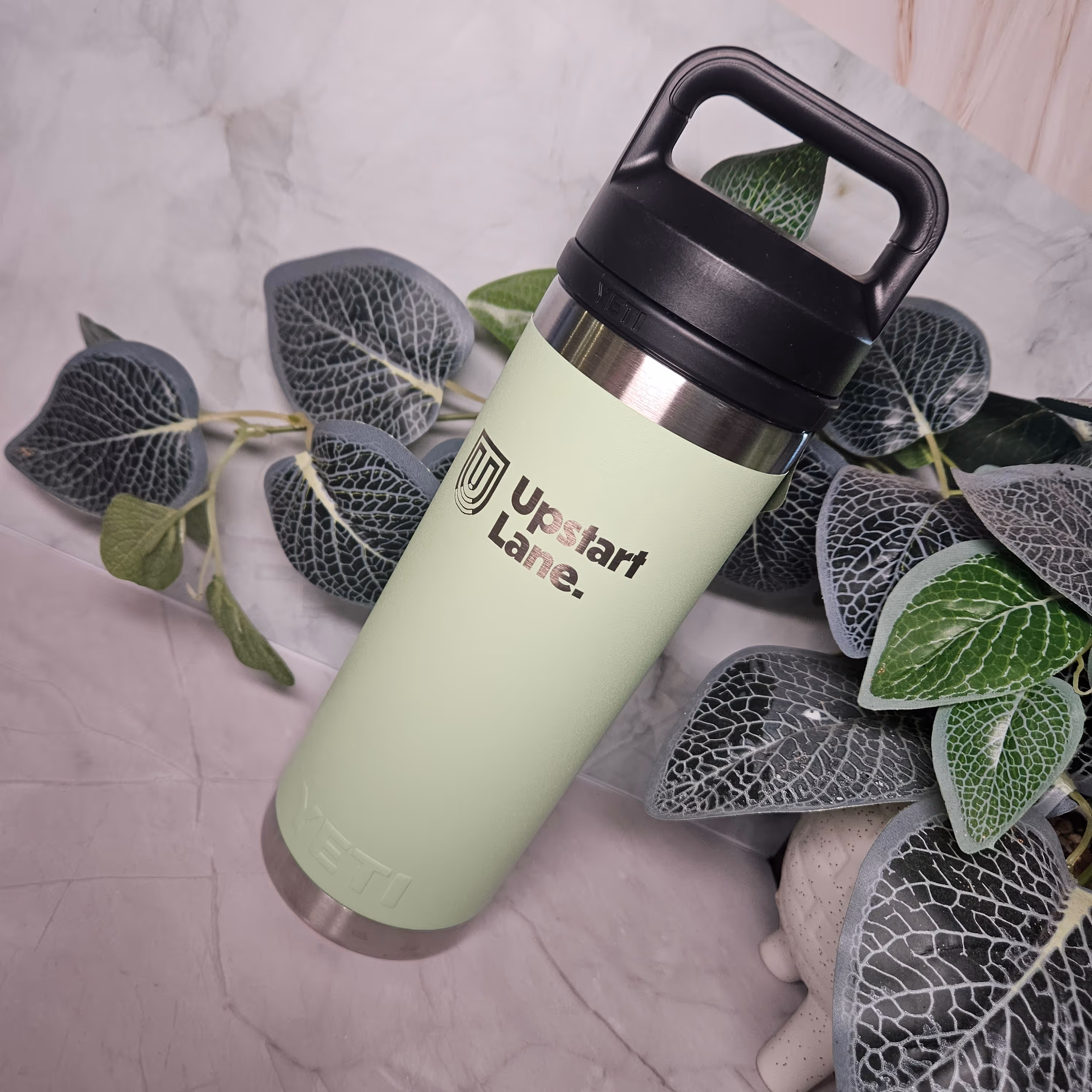 A custom engraved Yeti water bottle for a Rockhampton business.