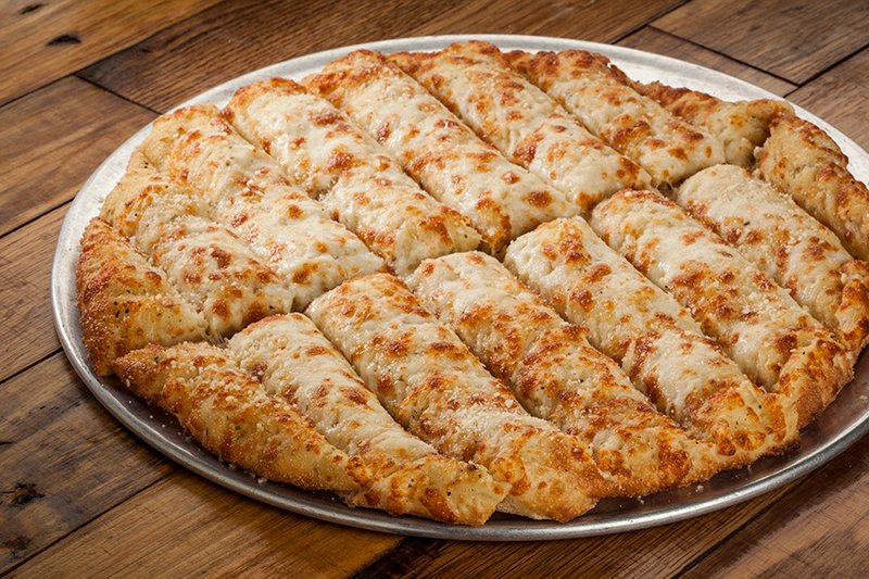 Image of a cheesy pan of Pokey Stix