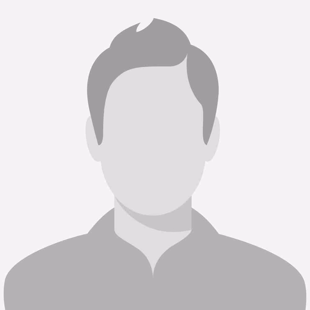 Generic gray male avatar silhouette with short hair and collar shirt on light gray background.
