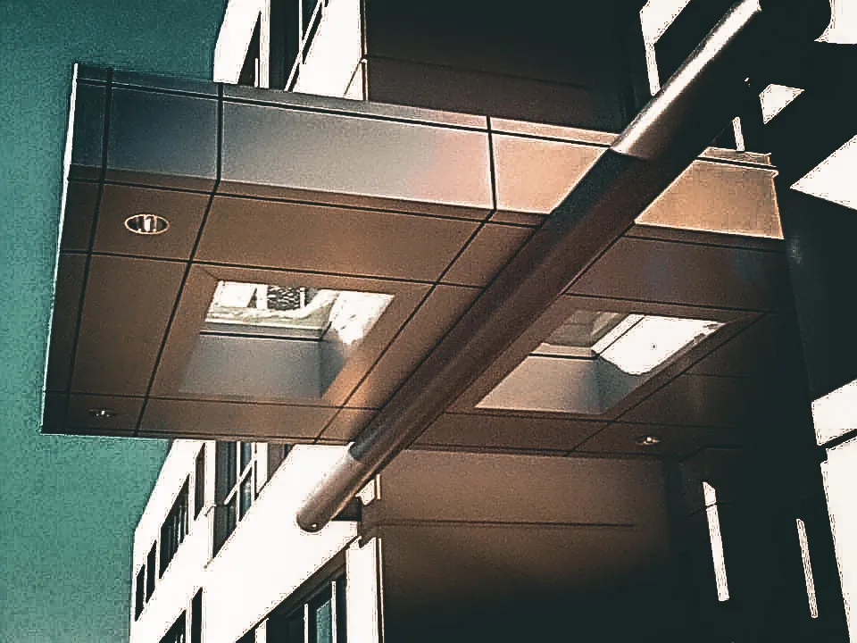 Commercial exterior with modern architectural shades, awnings, and signs