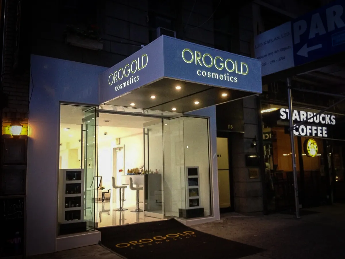 Martino Signs: Orogold Cosmetics storefront with illuminated signage at night