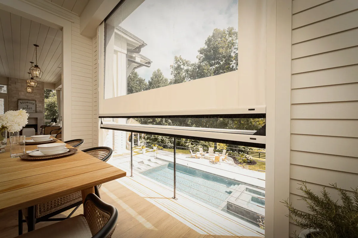 Commercial interior and exterior with signs, awnings, shades overlooking pool