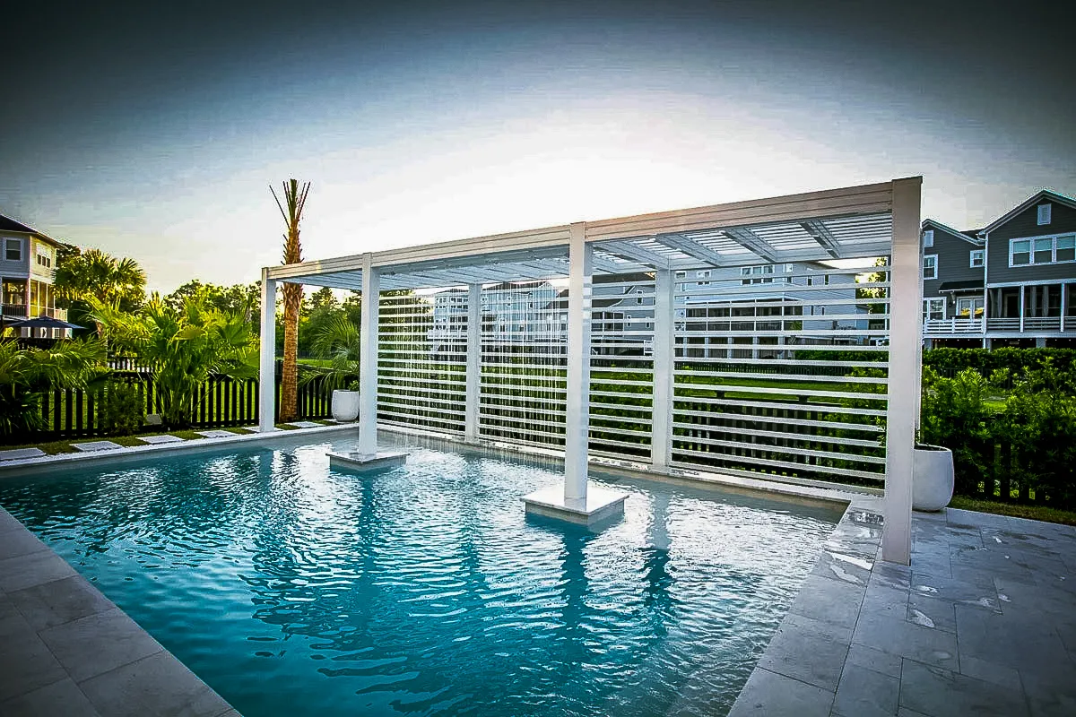 Commercial exterior pool area with modern shades, awnings, and architectural signs