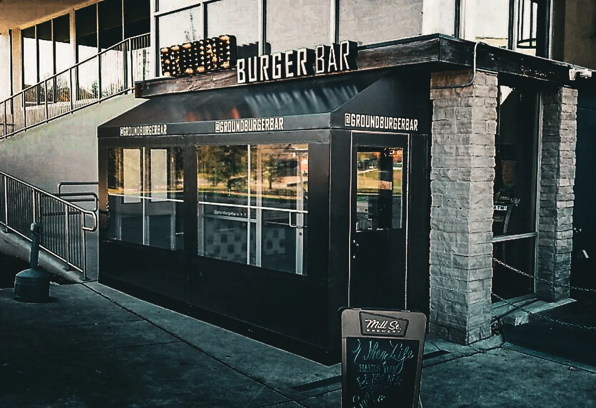 Commercial Burger Bar exterior with modern signs, awnings, and shades