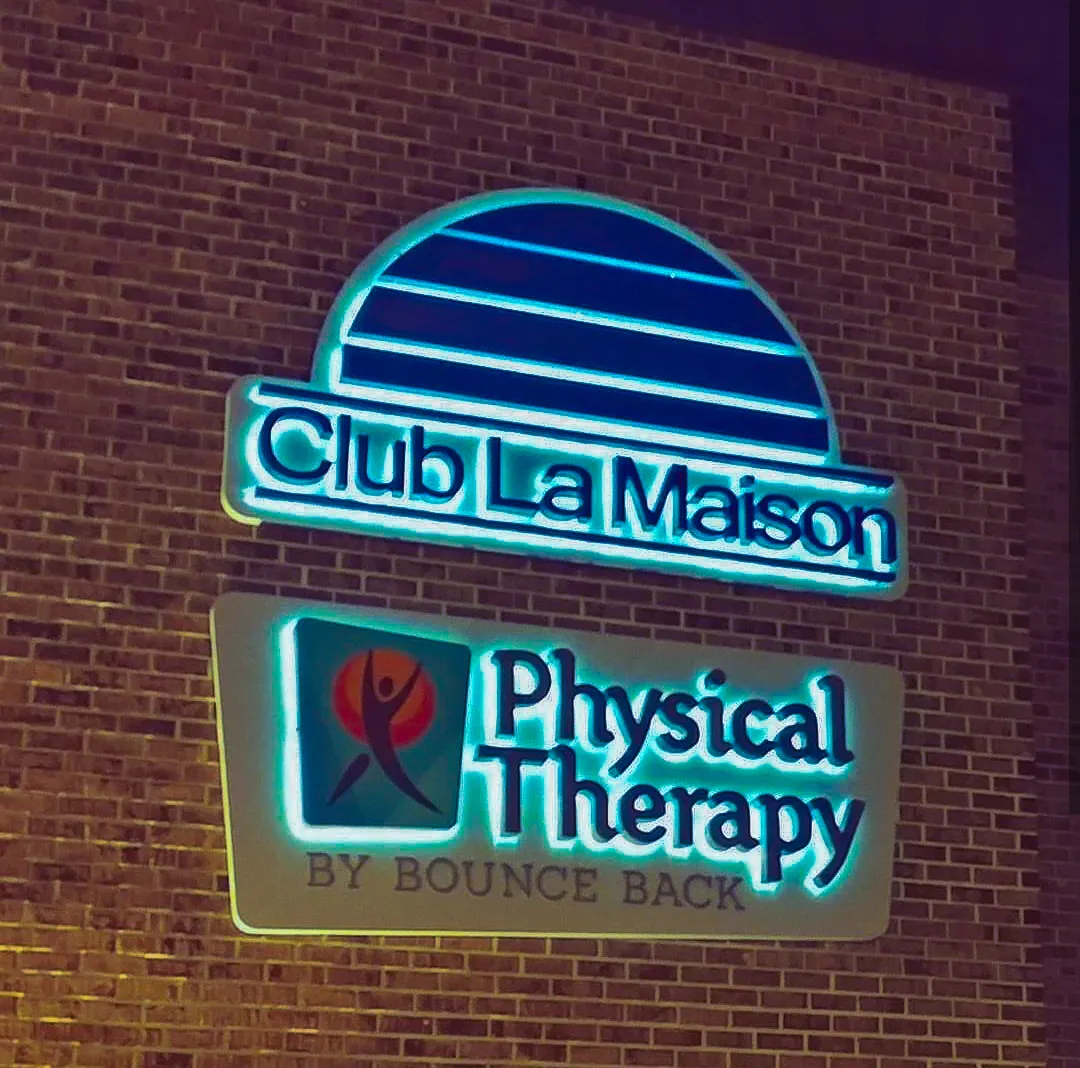 Commercial exterior signs for Club La Maison Physical Therapy with awnings