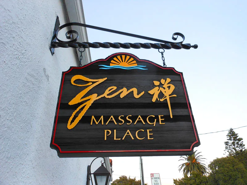 Commercial exterior sign for Zen Massage Place with decorative hanging awning