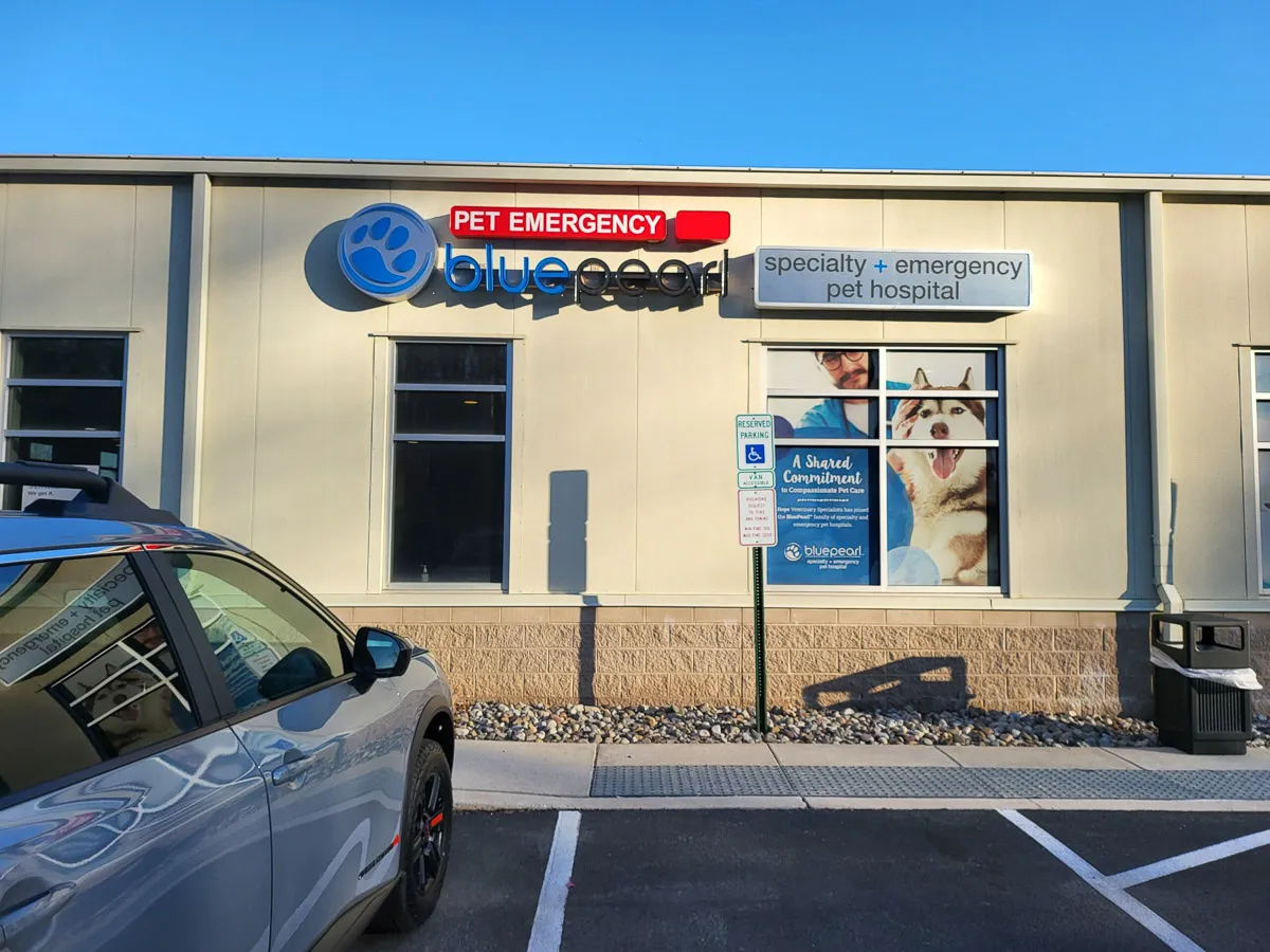 Commercial exterior of Blue Pearl pet emergency hospital with signs and awnings