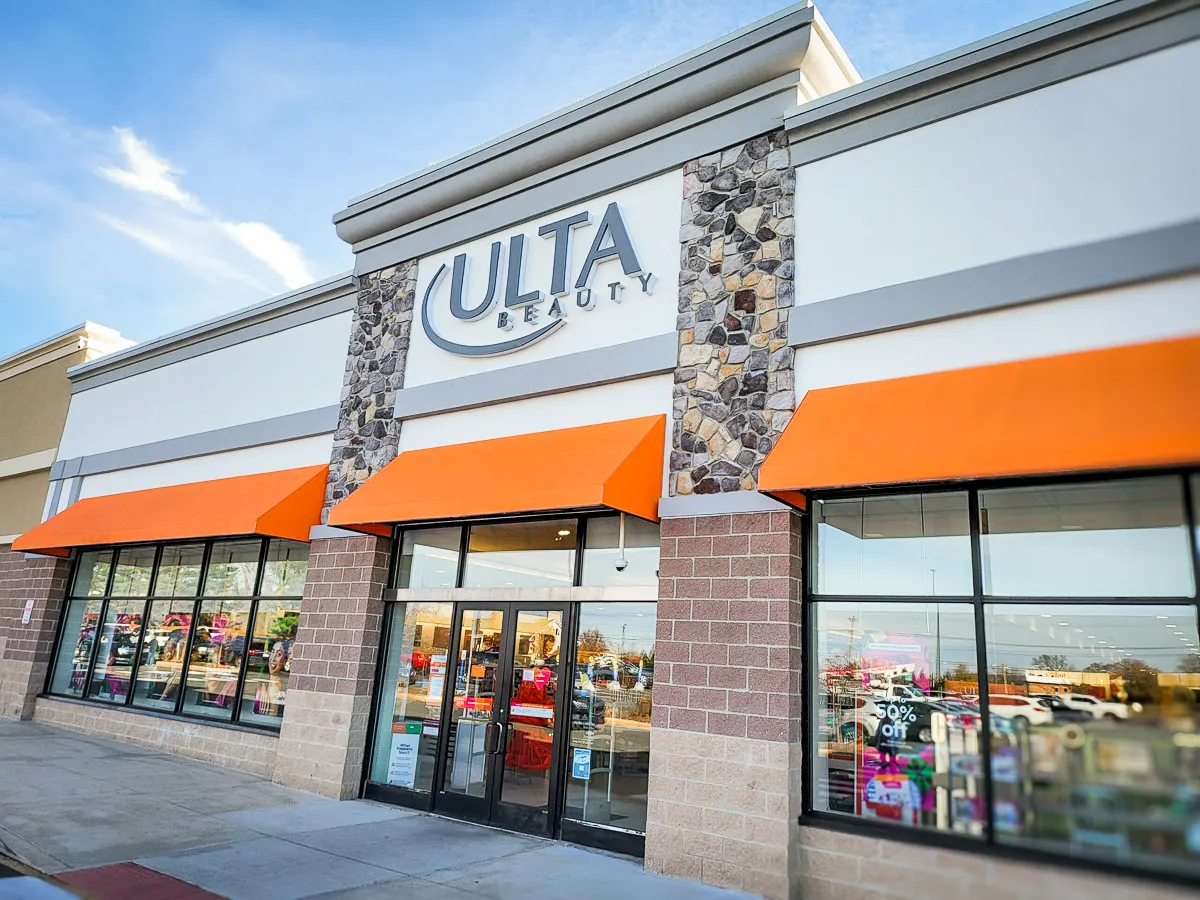 Commercial Exterior of Ulta Beauty Store with Orange Awnings and Signage