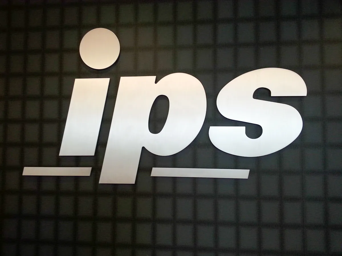 Commercial interior exterior signs with IPS logo on textured background