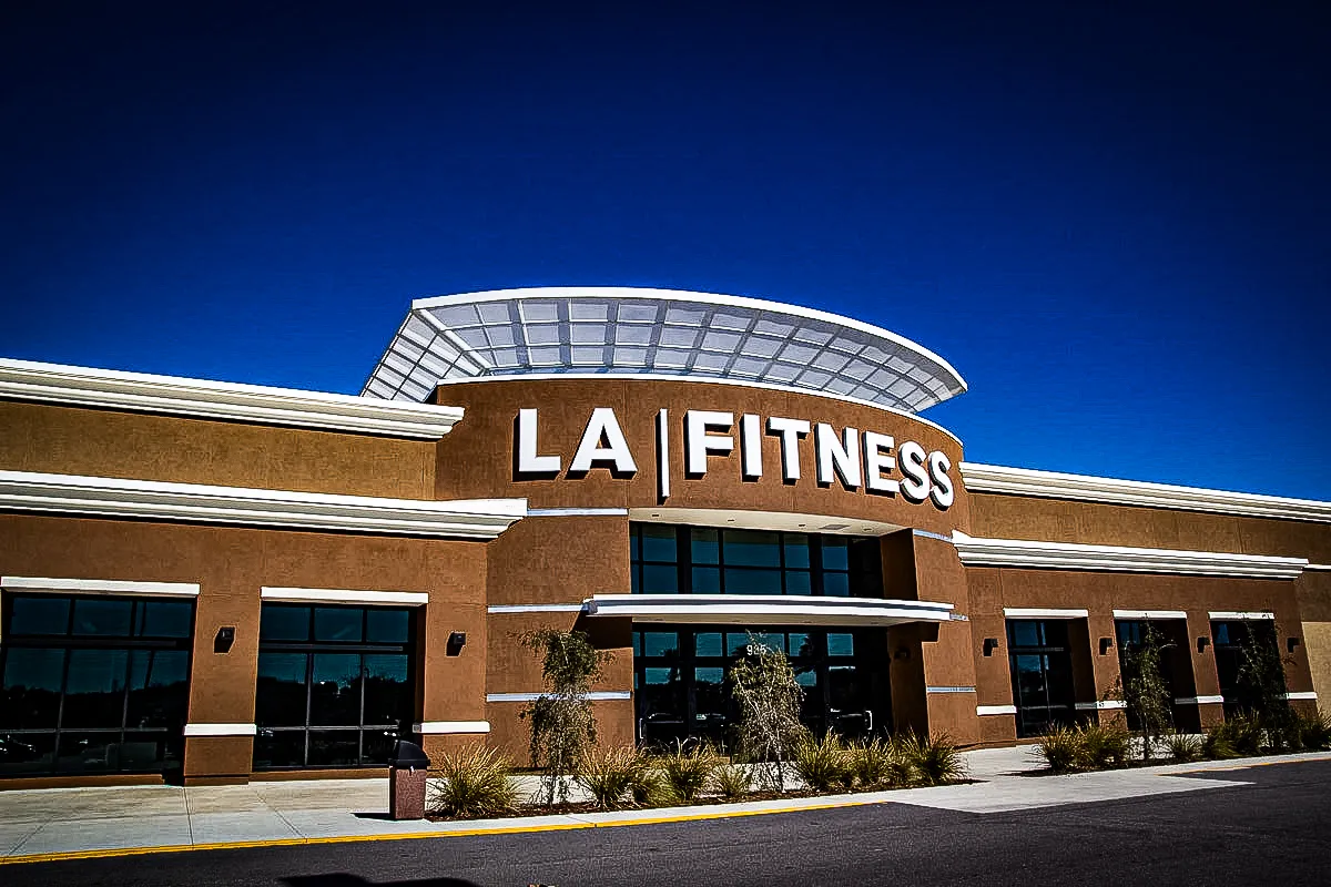 Commercial Exterior of LA Fitness with Signs, Awnings, and Shades