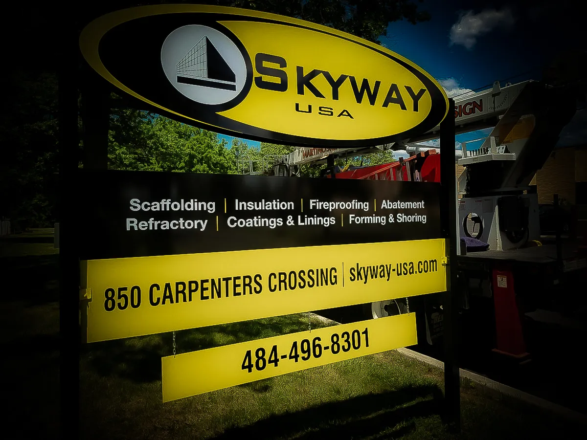 Commercial exterior sign for Skyway USA with services and contact information