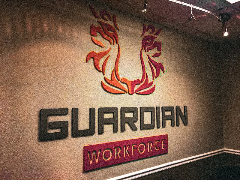 Commercial interior sign for Guardian Workforce with exterior shades and awnings