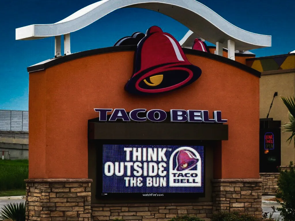 Commercial Exterior Taco Bell with Digital Signs, Awnings, and Shades