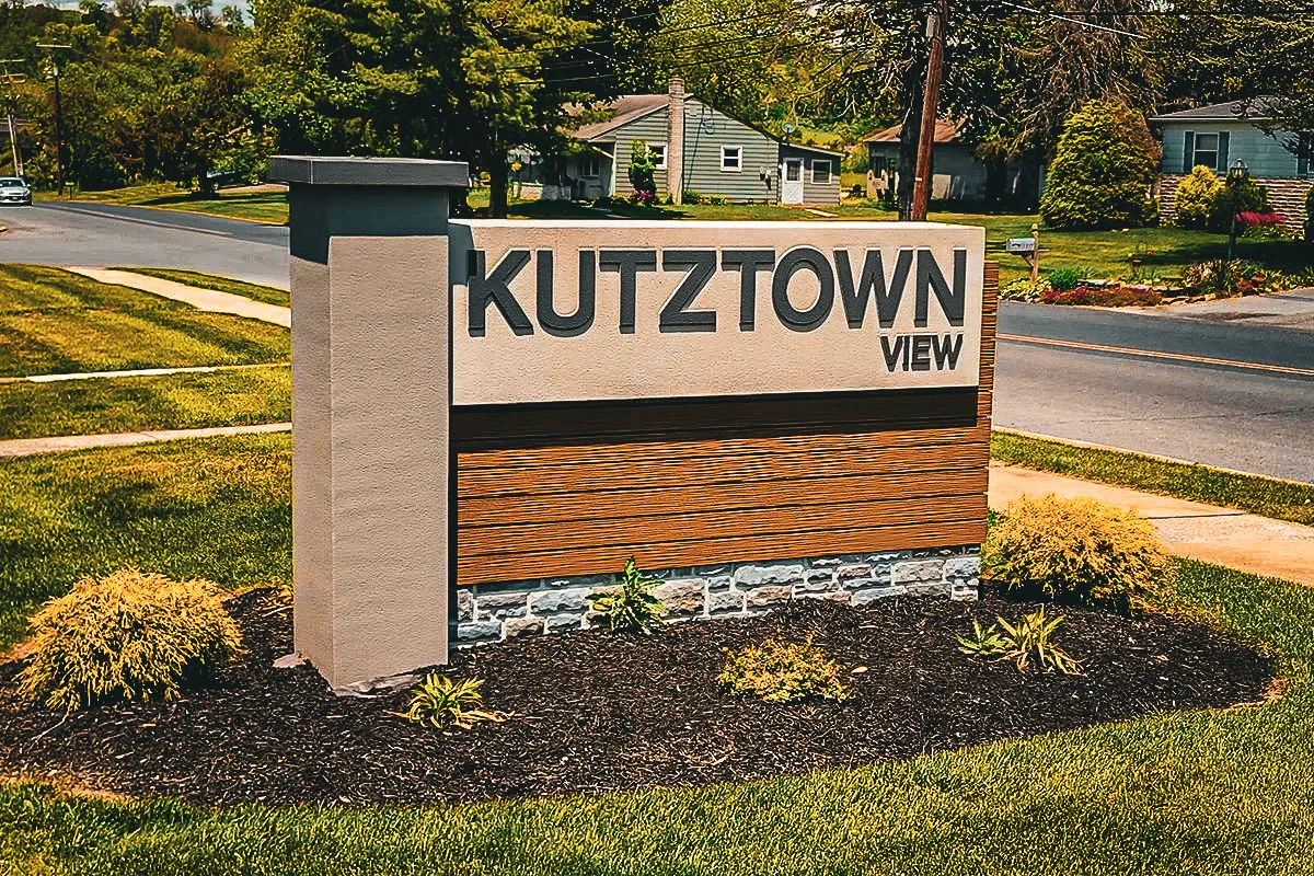 Commercial exterior sign for Kutztown View with landscaped shades and awnings