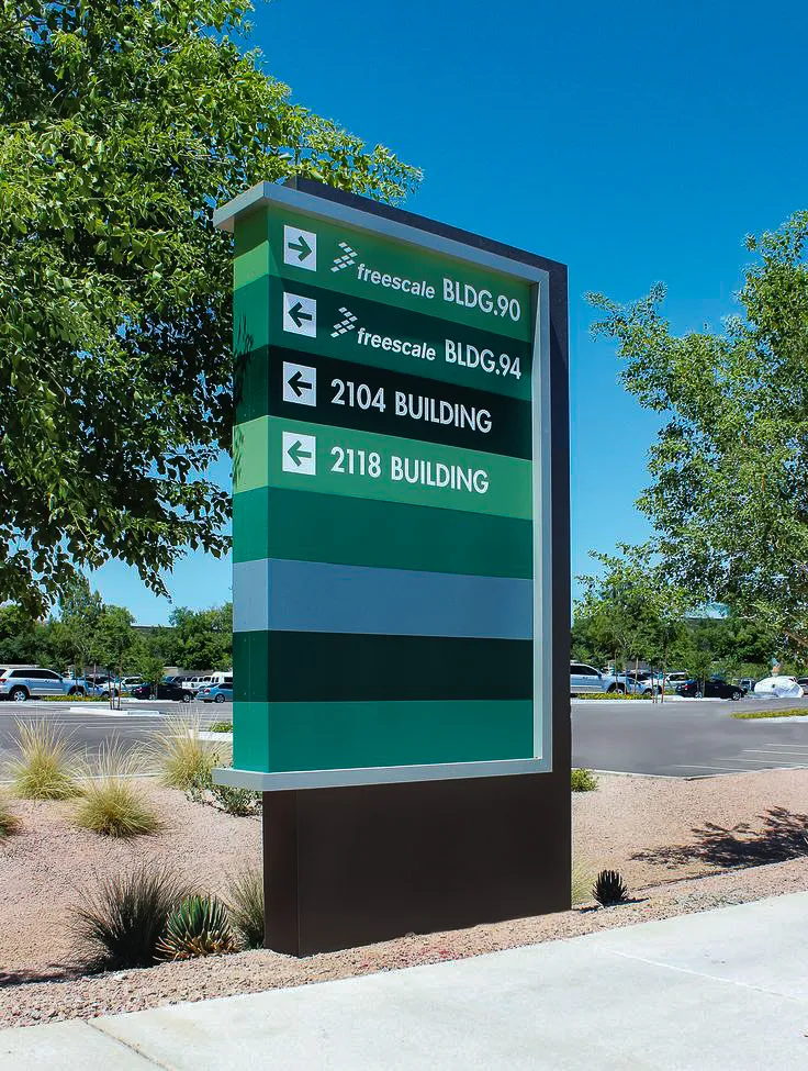 Commercial exterior wayfinding signs for Freescale buildings with shades