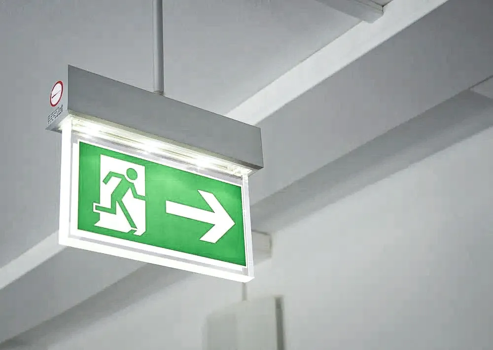 Commercial interior emergency exit sign with green shades and awnings