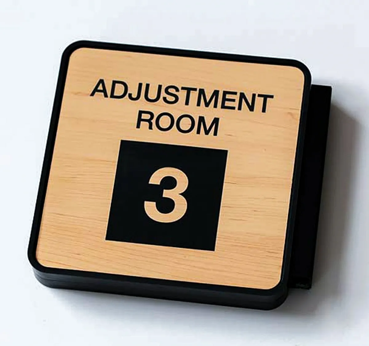 Commercial interior sign for Adjustment Room 3 with wood-grain exterior