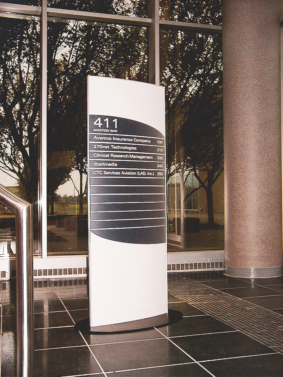 Commercial interior and exterior building directory sign with multiple company listings
