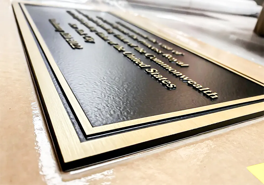 Commercial interior and exterior signs, awnings, and shades plaque