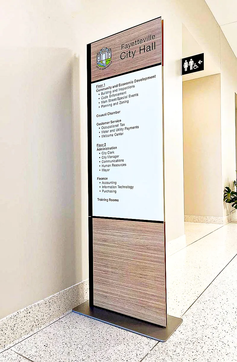 Commercial interior signage for Fayetteville City Hall with exterior wayfinding