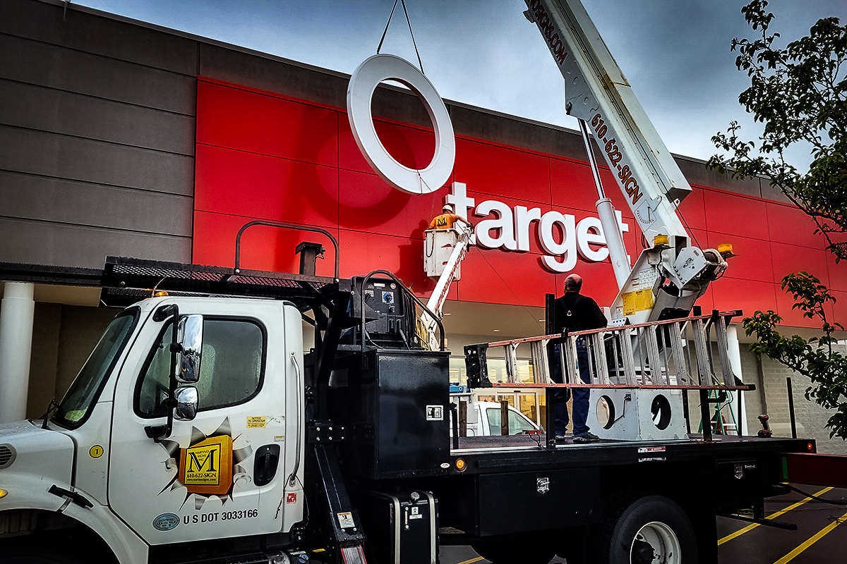 Storefront and wayfinding signage for retail stores and shopping centers by Martino Signs & Awnings