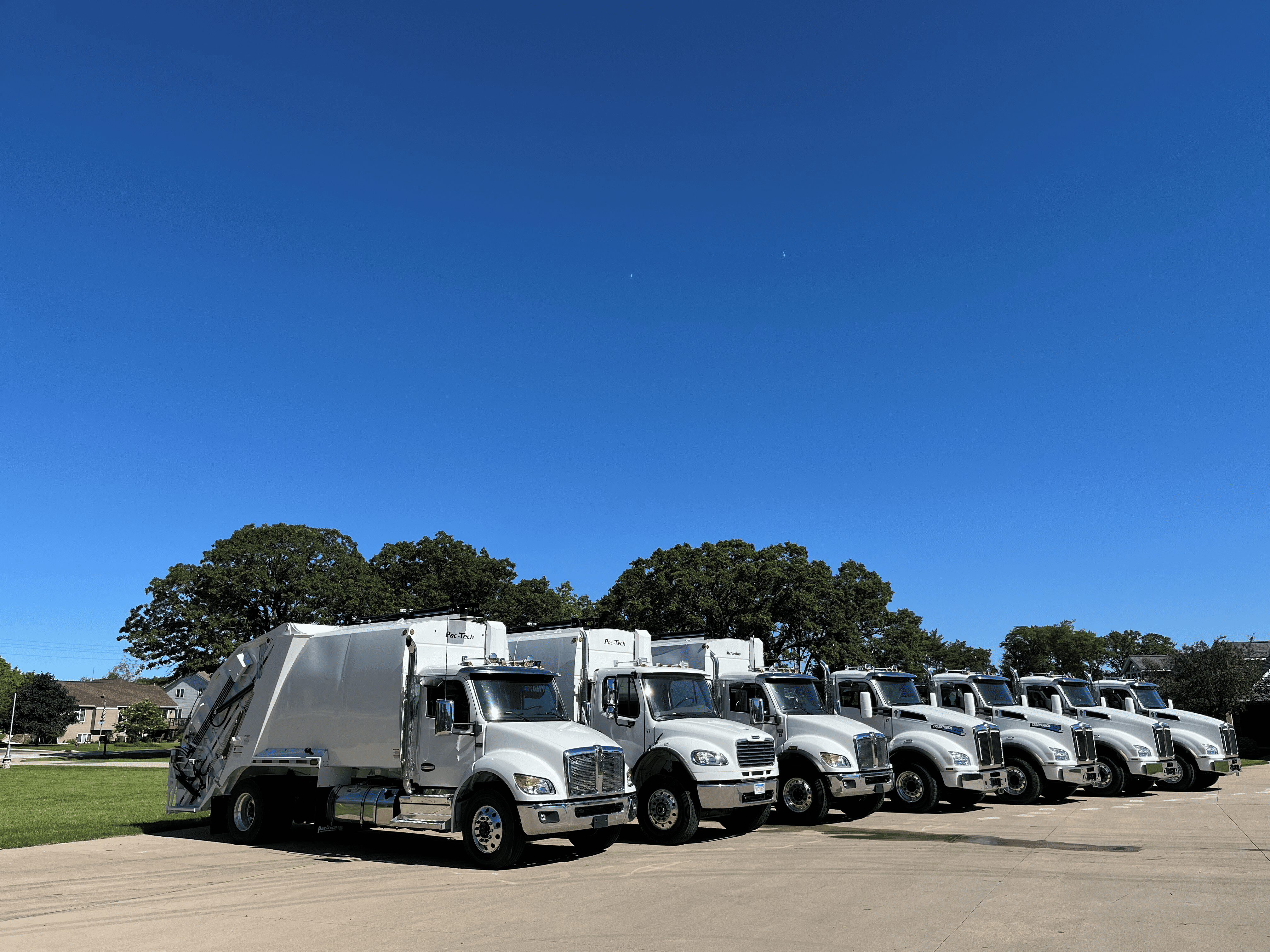 Modern waste management trucks with advanced technology and reliable performance features#1.9