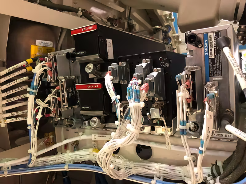 JetSupport certified engineers performing line maintenance on a business jet engine