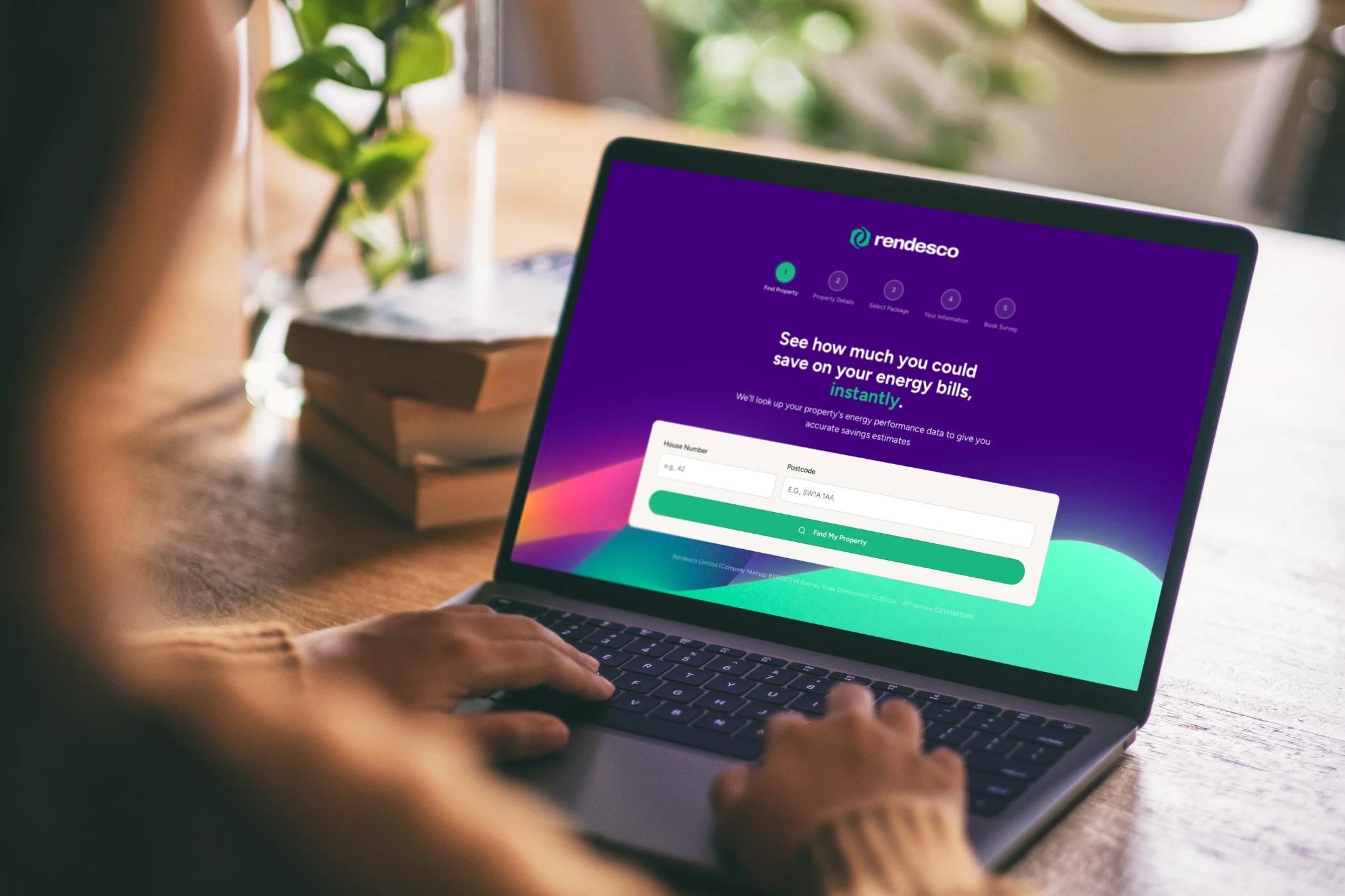Laptop showing energy bill savings comparison website with Trustpilot rating