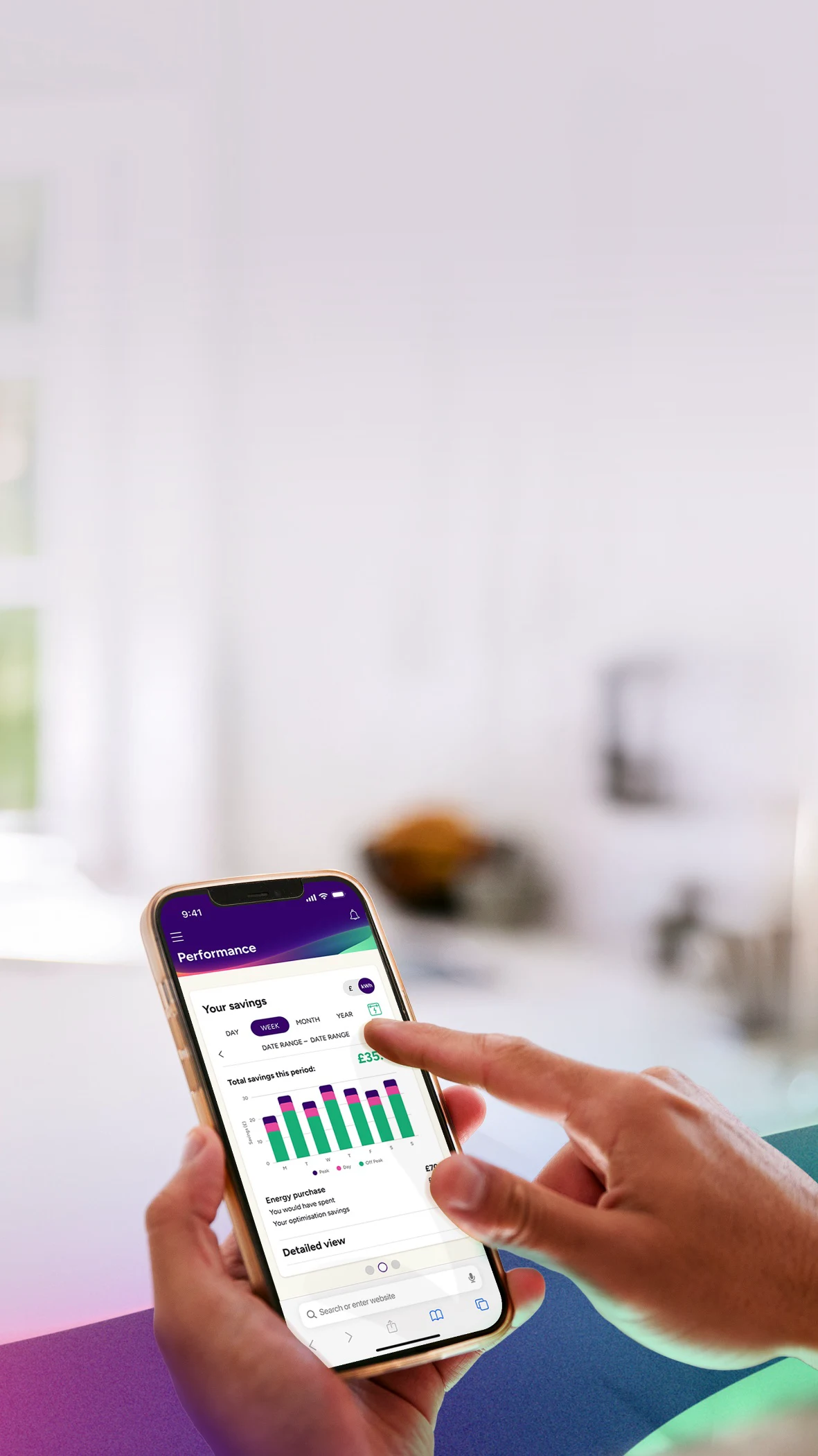 Two colleagues drinking coffee and using smartphone in office