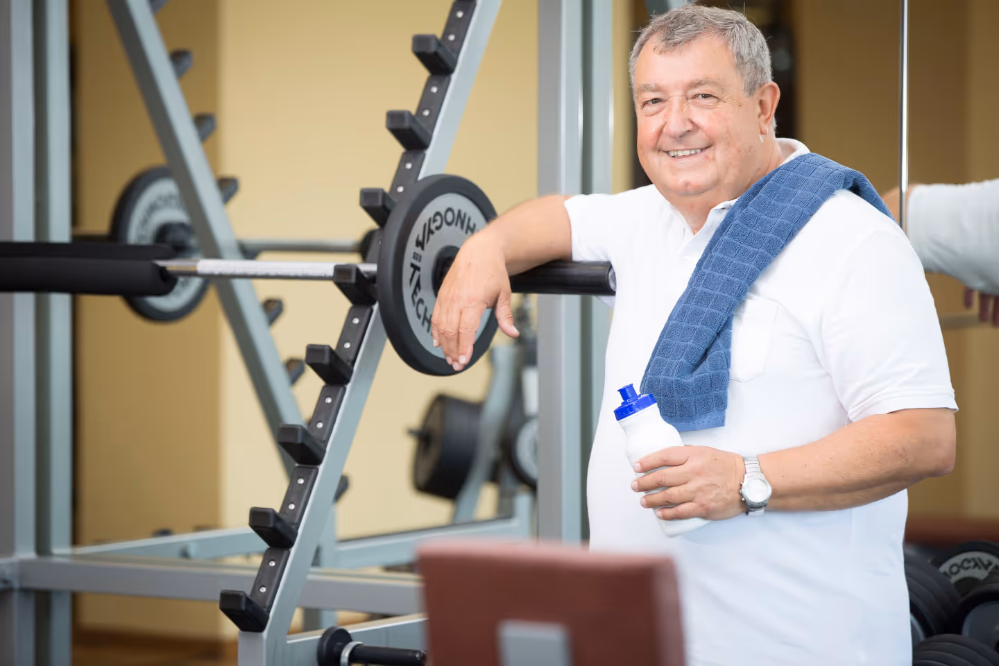 Kunde von MTC an der Langhantel