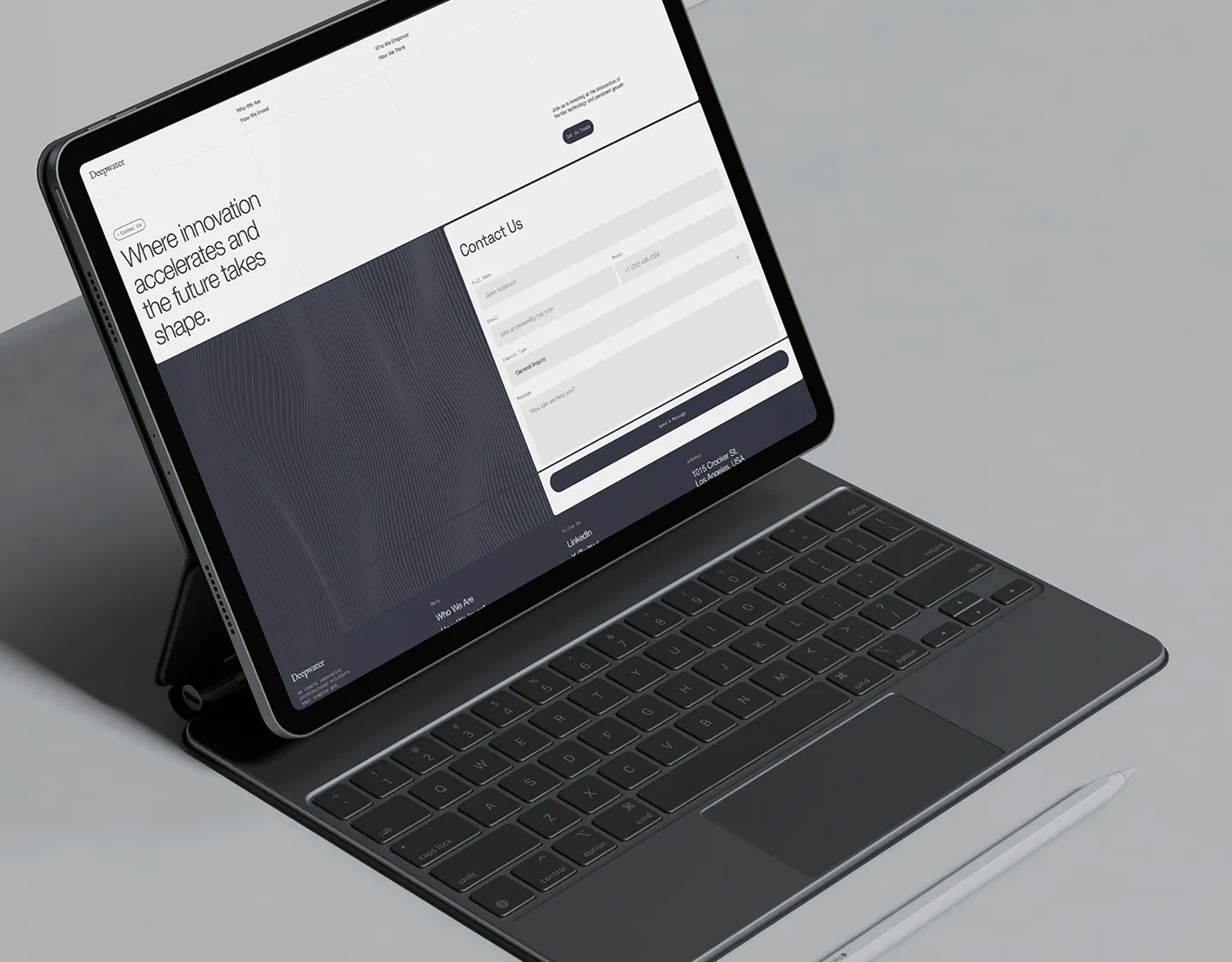 Deepwater website displayed on a laptop in a dark workspace.