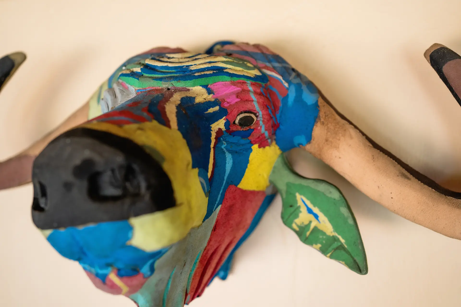 Close-up of buffalo head made from recycled flip flops