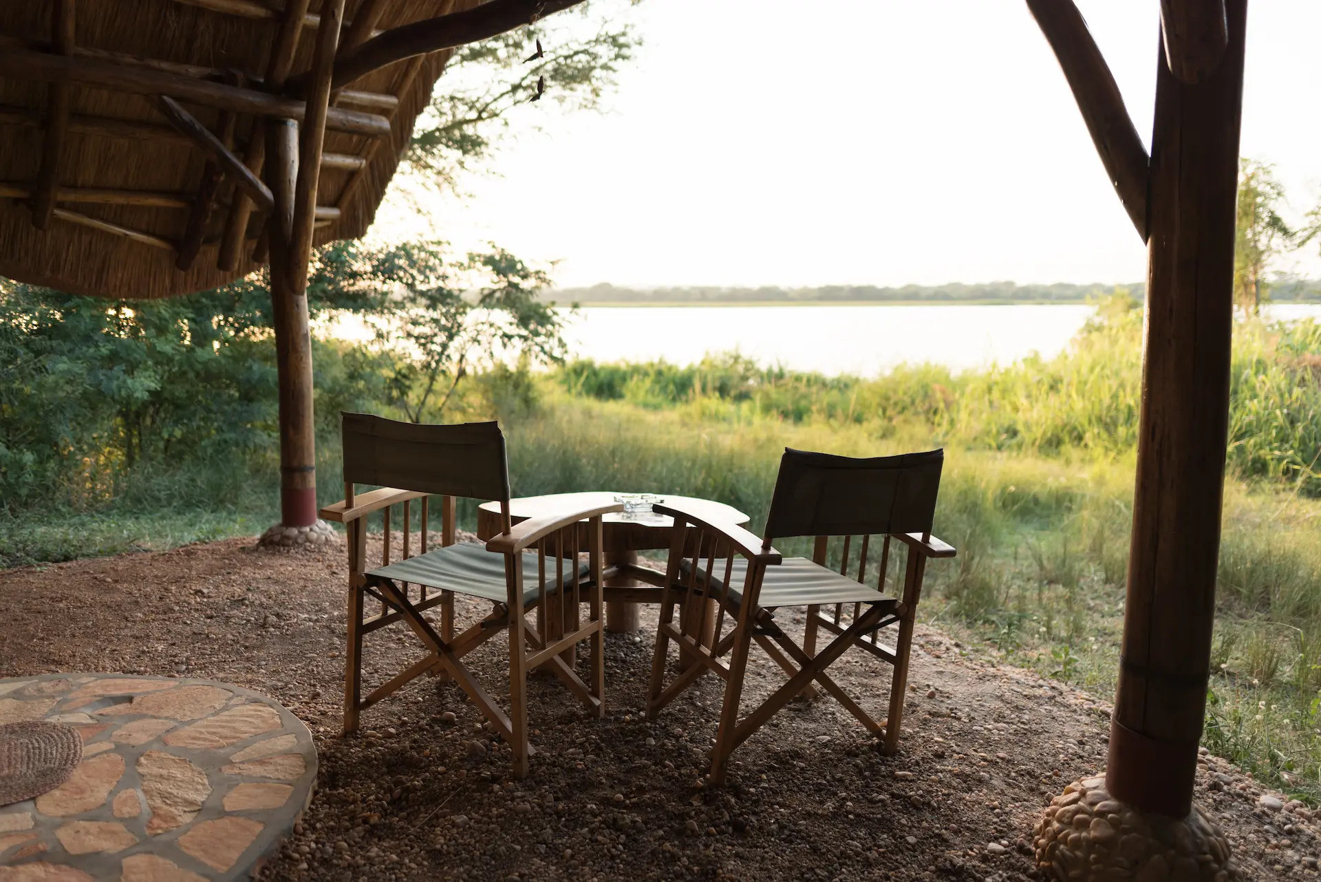Outside veranda of Thatched River Tent with River Nile view. 