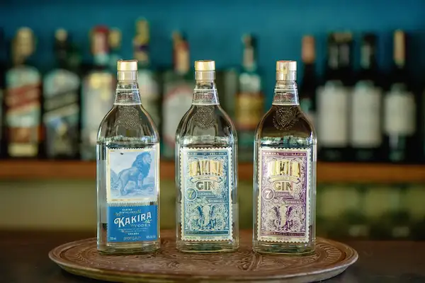 Three bottles of alcohol on display at Murchison River Lodge restaurant and bar, including one Kakira Vodka and two bottles of gin.