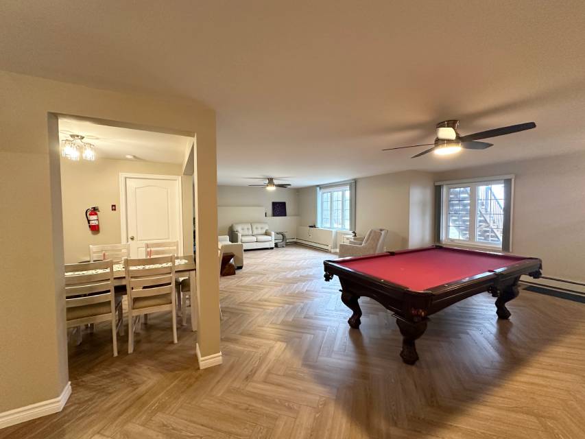 Finished basement family room with built-in storage