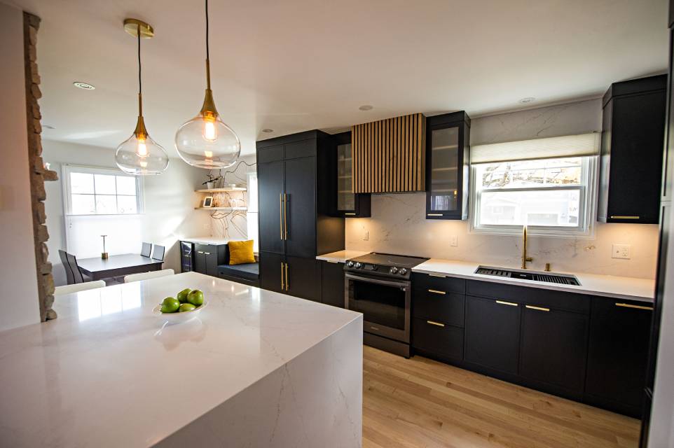 Kitchen renovation with custom millwork and under-cabinet lighting
