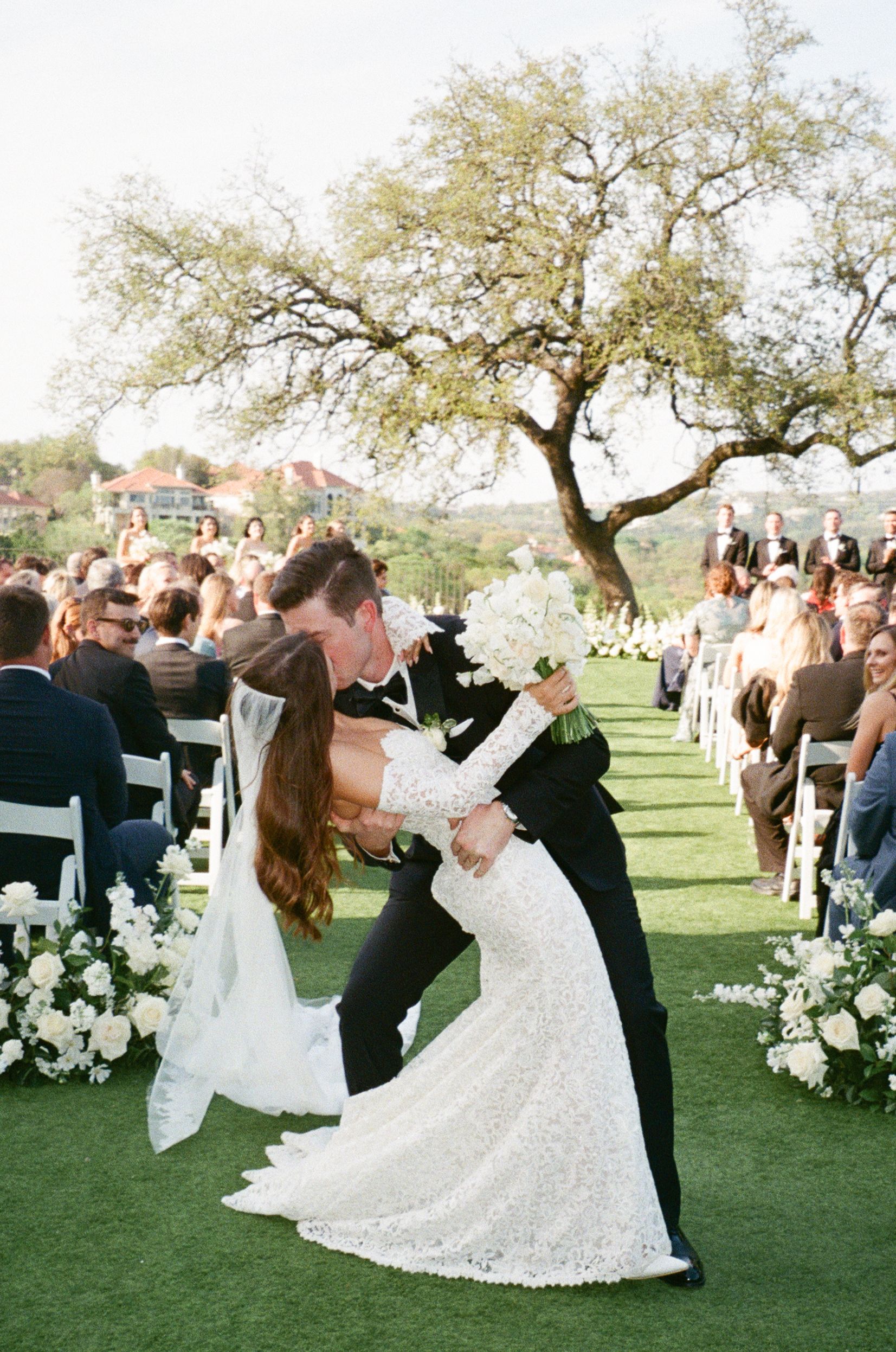 Brida and groom kissing