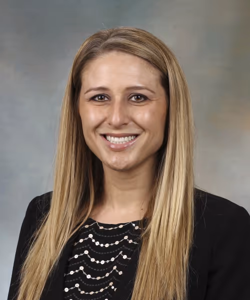Dr. Victoria Aimé's professional headshot photo in plastic surgery residency.