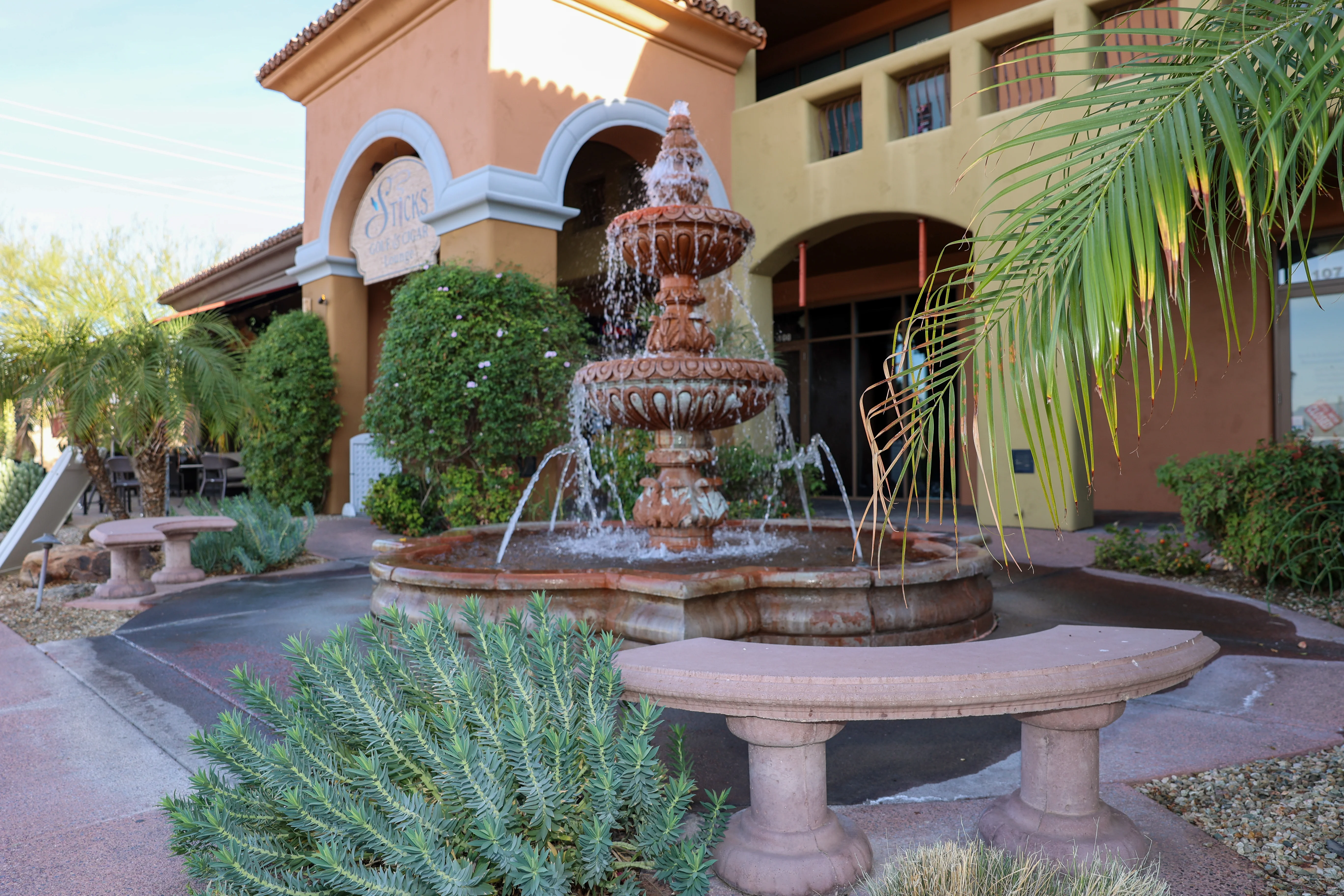 Exterior fountain and landscaped entrance in Carefree Arizona near Metropolitan Plastic Surgery’s Carefree office location.