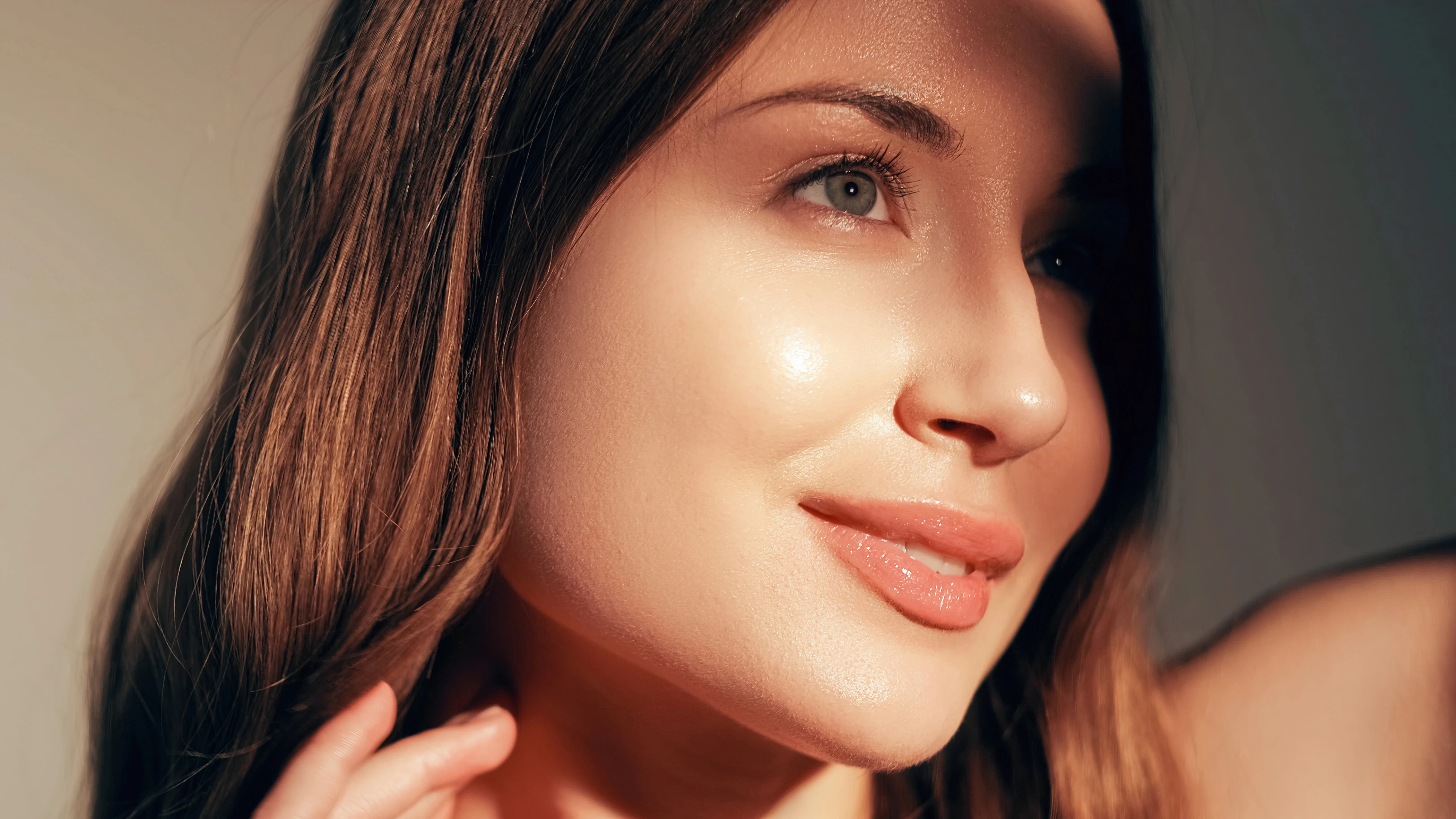 Close-up of woman’s glowing, healthy skin representing rejuvenation from PRP, growth factors, and exosome treatments