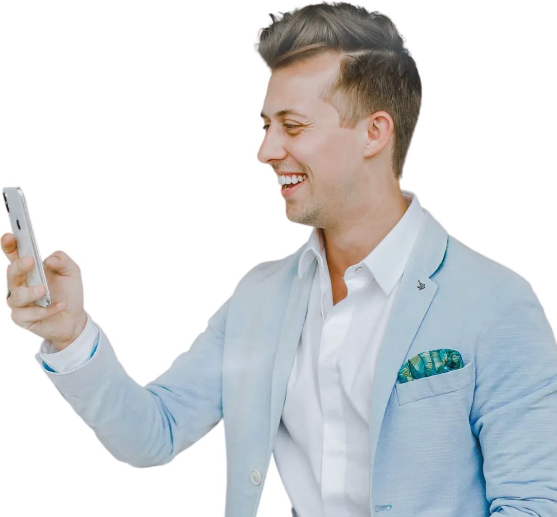 Man smiling looking at phone