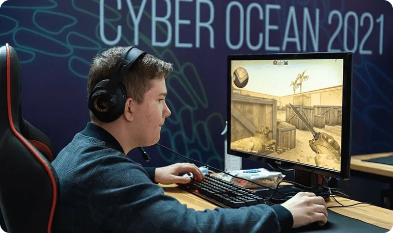 A man playing a game on a computer.