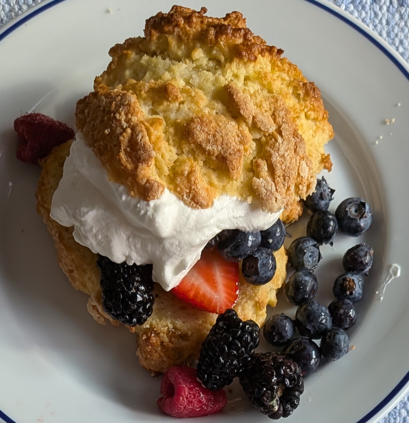 Rich shortcakes filled with berries and unsweetened whipped cream