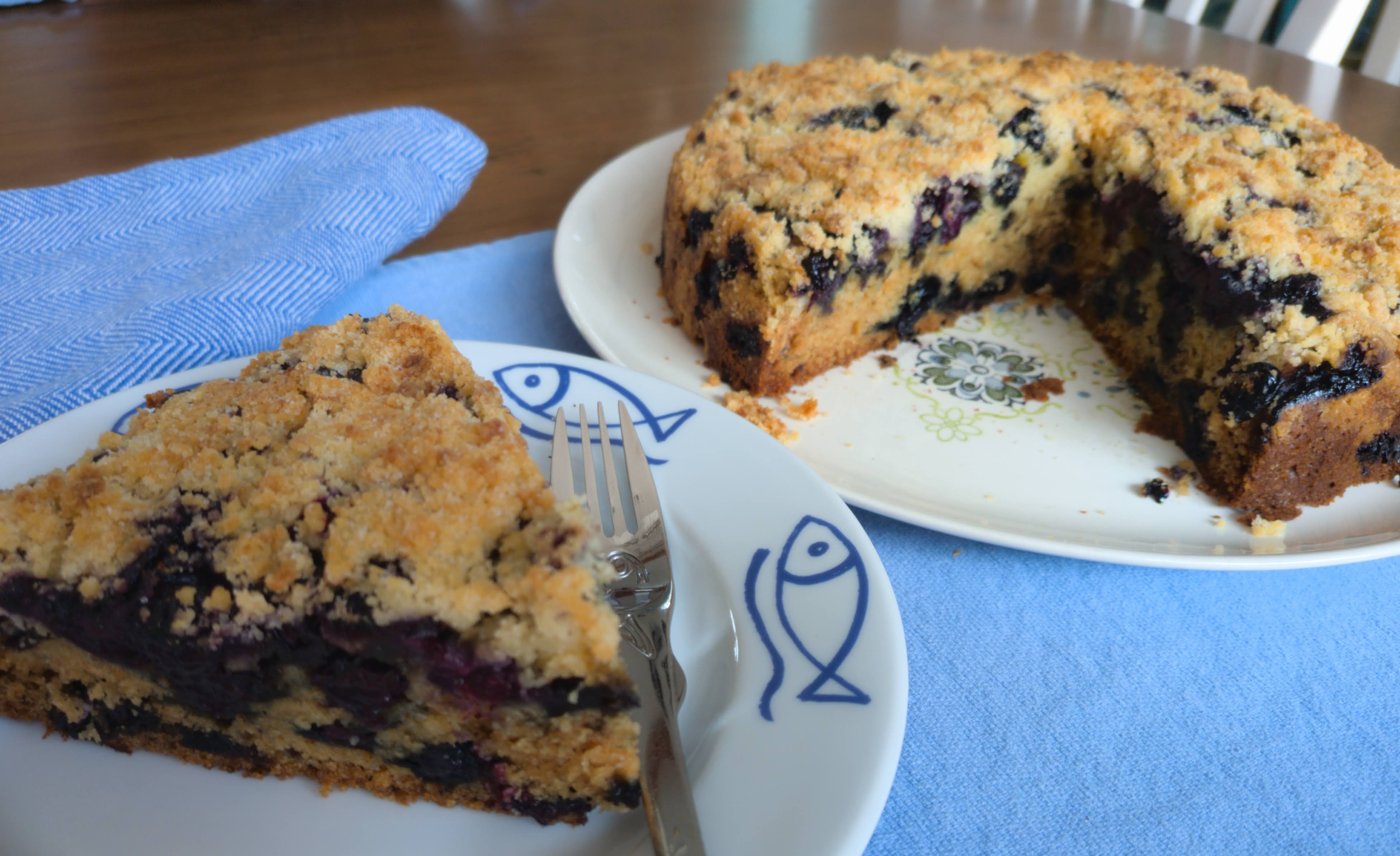 A slice of Buttery Blueberry Crumb Cake