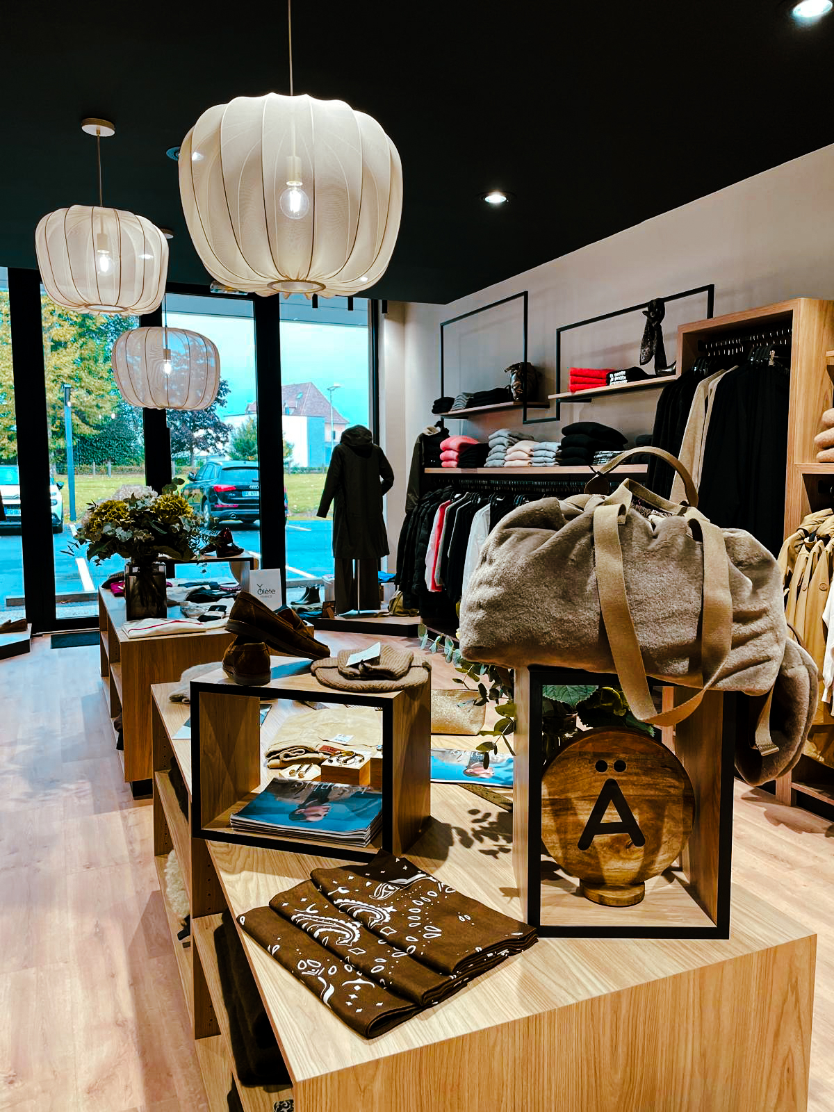 image of shopping bag at checkout counter (for a footwear store)