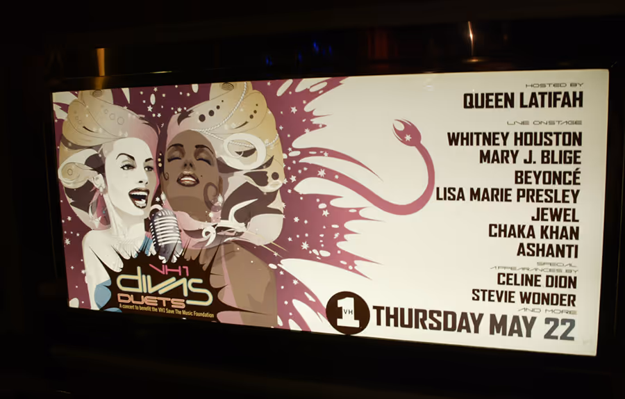 VH1 Divas Duets 2003 MGM Grand Garden Arena Las Vegas venue advertising campaign featuring Beyoncé, Whitney Houston, Celine Dion, and Chaka Khan, art direction by Myriam López. Designed and creative-directed by Myriam López