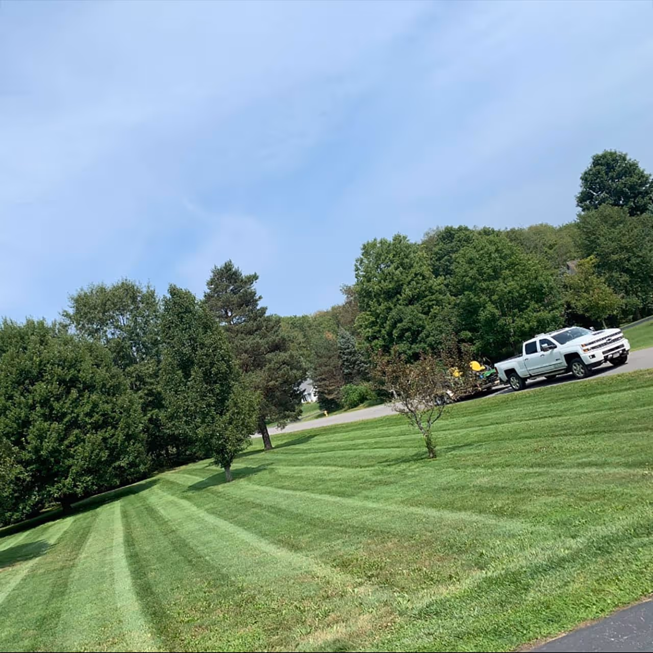Lawn mowing with clean stripes in Rochester NY