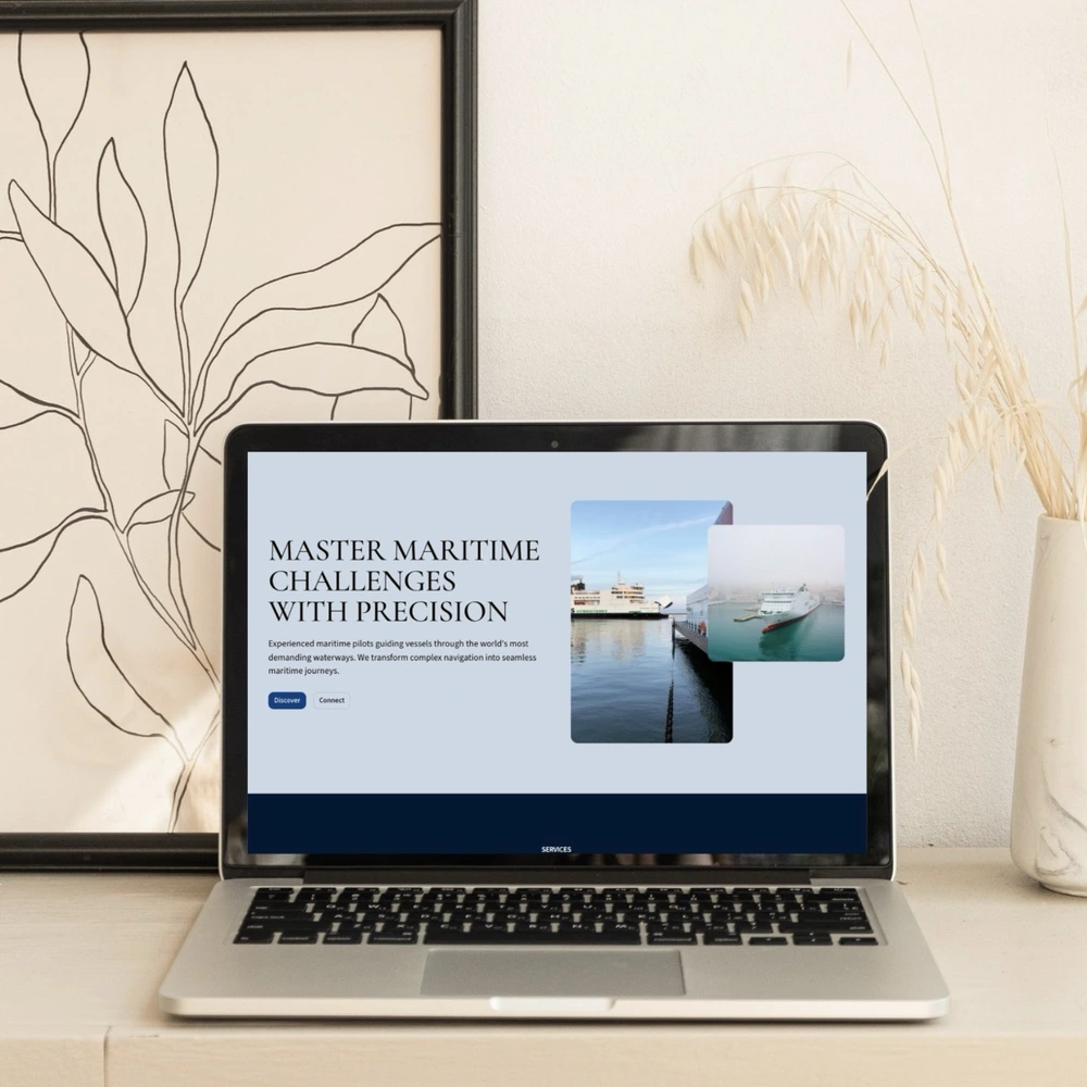 Laptop on desk displaying the Mapping Advertising Assets Project (MAAP) Leeds website, surrounded by a gold lamp, books, glasses, and a cup on a saucer.